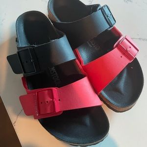 Raspberry and black Birkenstock’s